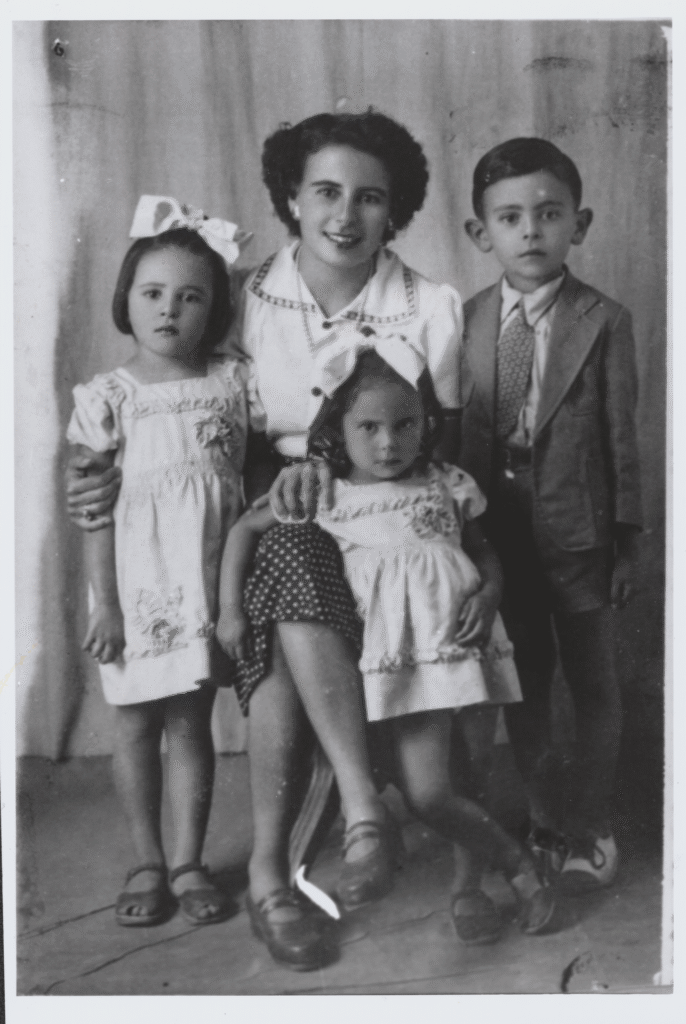 Lucia Rocha and her children Ana Marcelina, Anecy, and Glauber.